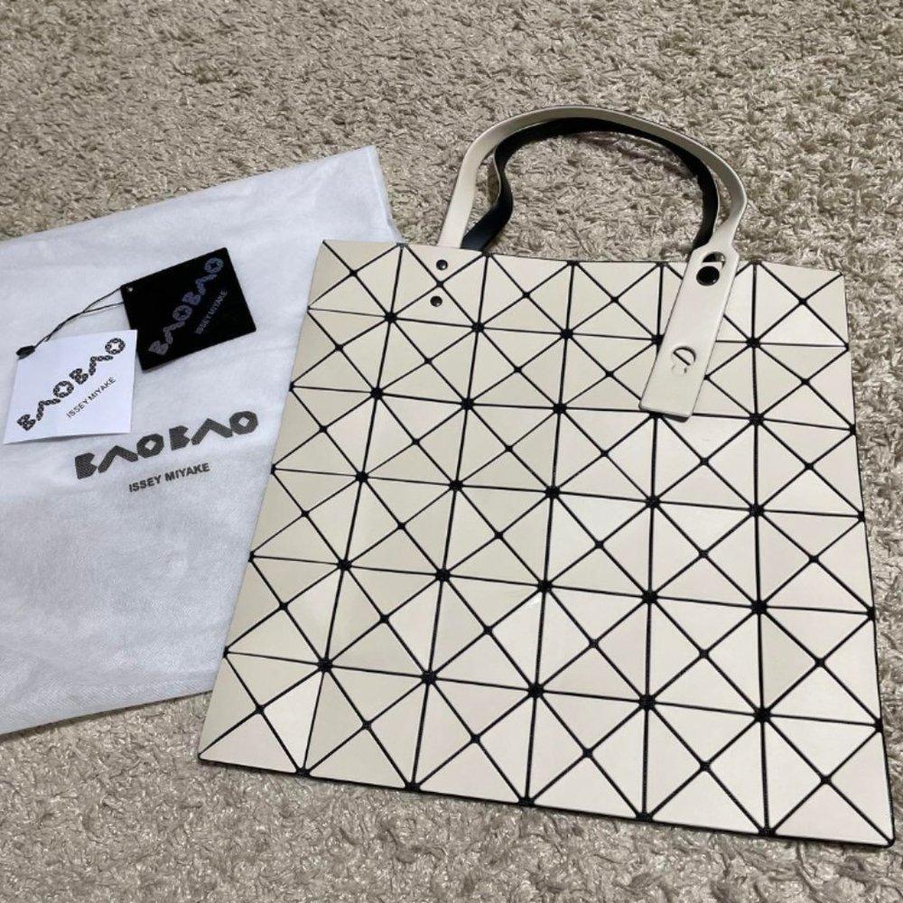 Barely handled, in near-new condition. Issey Miyake